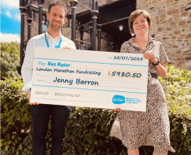 Jenny Barron and Adam Brunskill with Manorlands cheque
