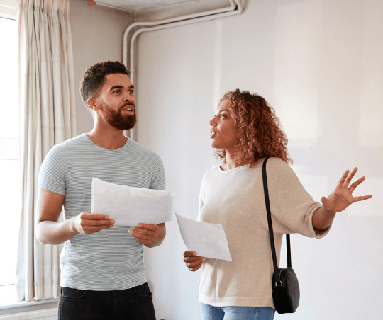 Couple looking at house to buy